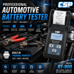 CSP BT-900 professional automotive battery tester displaying voltage, equipped with heavy-duty red and black testing clamps.
